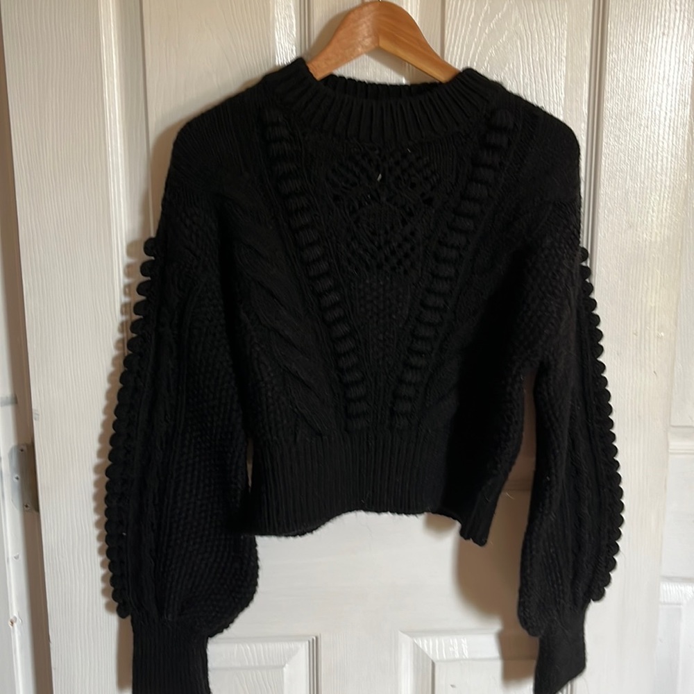 Black sweater from Anthropologie. Cable knit acrylic blend.